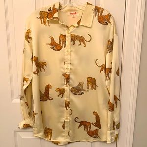 Blouse NEW cheetah print. Never worn.